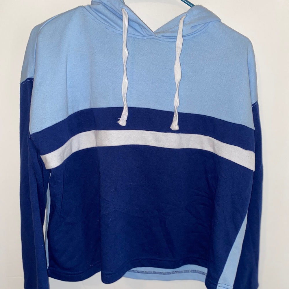 sort of cropped white and blue striped pullover
